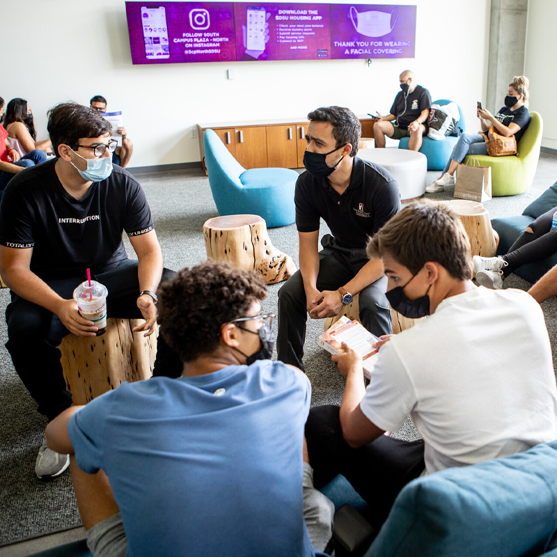 Students sitting in a discussion group